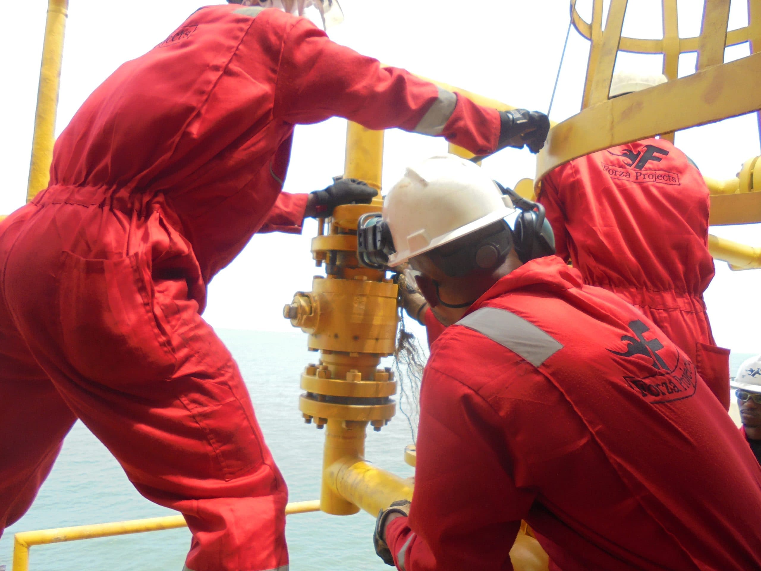 Forza Projects crew servicing a wellhead valve over open water